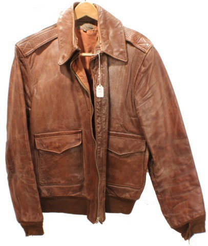 UNIFORM - US AVIATOR A2 TYPE LEATHER JACKET: UNIFORM - US AVIATOR A2 TYPE LEATHER JACKET Leather flight jacket, type A2. Size 40. Cooper Sportswear MFG Co. Worn. Size: Various Condition: Fair/ worn EST. 100-200