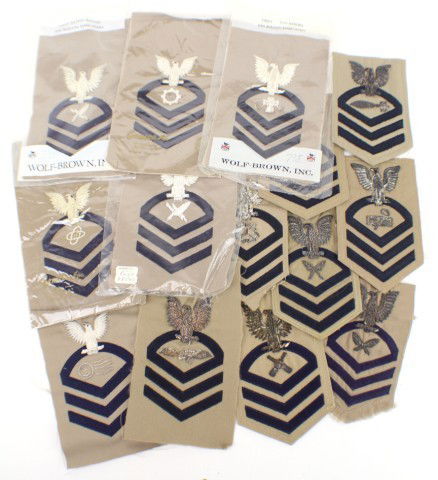 14 US NAVY SILVER BULLION CPO ARM PATCHES: 14 US NAVY SILVER BULLION CPO ARM PATCHES A selection of silver bullion embroidered arm patches, all to Chief Petty Officers rate, Some are new, unissued, others are removed from uniform. Khaki dress