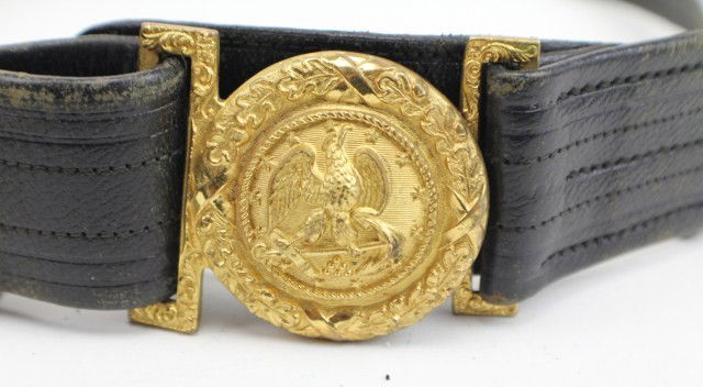 19TH CENTURY US NAVY OFFICERS DRESS SWORD BELT: 19TH CENTURY US NAVY OFFICERS DRESS SWORD BELT Leather belt of 38" mounted with brass fittings and a gilt metal buckle. Two hang straps. Size: 38" Condition: Light wear, generally good EST. 100-200
