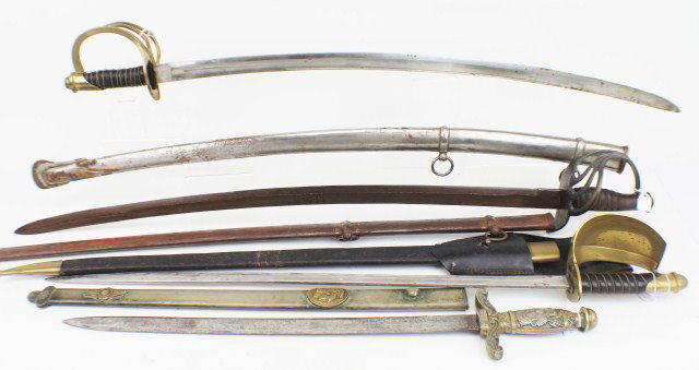 FOUR REPRODUCTION SWORDS: FOUR REPRODUCTION SWORDS Lot of four reproduction swords to include: 2 civil war era model 1860 cavalry sabers, a 19th century Naval scimitar and a gladius. All in good condition and all complete with