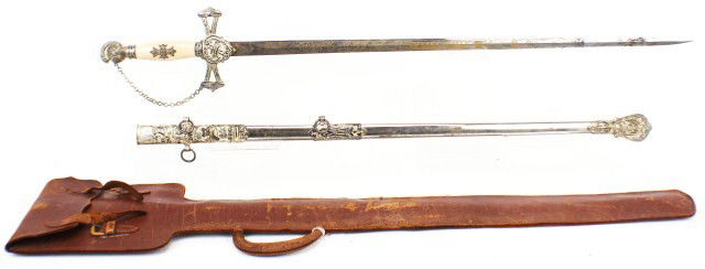 KNIGHTS TEMPLAR M C LILLEY & CO SWORD W/SHEATH: KNIGHTS TEMPLAR M C LILLEY & CO SWORD W/SHEATH Ceremonial Knights of the Templar sword commissioned for Harold Burse. One side of the sword has "Harry Burse" along with the case. Made between 1865-188