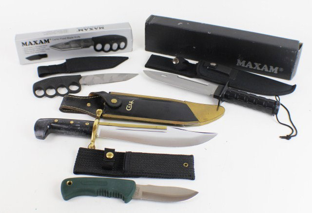 FIXED BLADE KNIFE LOT OF 4: Including: a Maxim Camo knife with knuckle grip (boxed). A Case XX Bowie. Maxim survival knife (boxed). A Schrade 1410T. All are in VGC Est$75 - 150