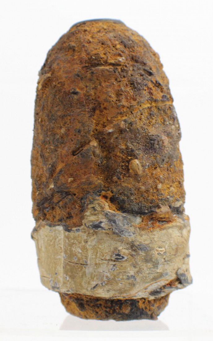 TYPE II HOTCHKISS CIVIL WAR SHELL: TYPE II HOTCHKISS CIVIL WAR SHELL. 3 inch Type II fired Hotchkiss shell from the Civil War. The brass nose fuse adaptor is in very good condition and the lead sabot is mostly present. Some deep pittin