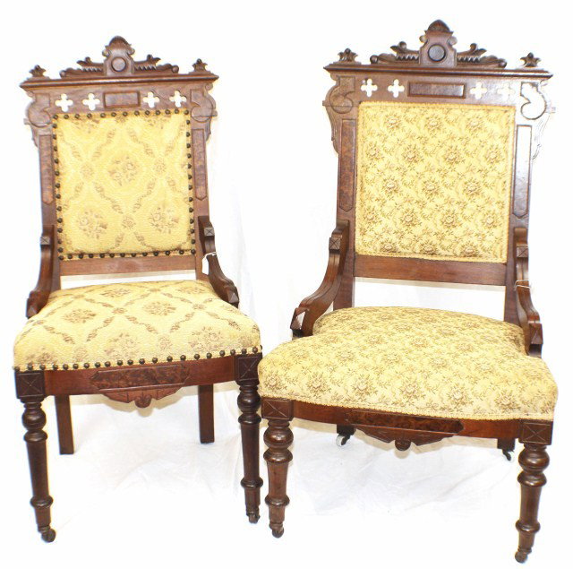 2 VICTORIAN EASTLAKE CHAIRS FLORIAL DESIGNS: 2 VICTORIAN EASTLAKE CHAIRS FLORIAL DESIGNS 2 Victorian Eastlake chairs with floral designs. First chair is on rollers has a dark floral design with minor dent in top of chair around head. Second chai