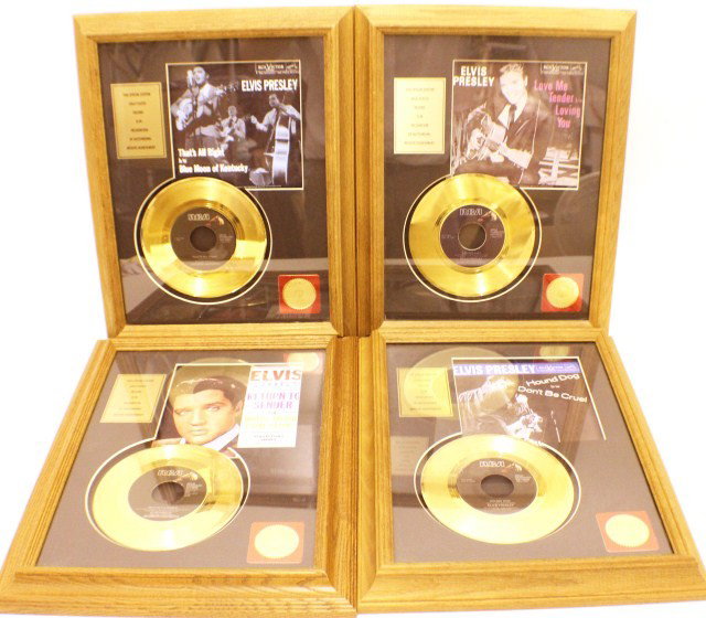 SPECIAL EDITION 24K GOLD PLATED ELVIS RECORDS: SPECIAL EDITION 24K GOLD PLATED ELVIS RECORDS Four separate framed gold records listed as follows: "Love Me Tender" & "Loving You" "That's All Right" & "Blue Moon of Kentucky" "Hound Dog" & "Don't be 