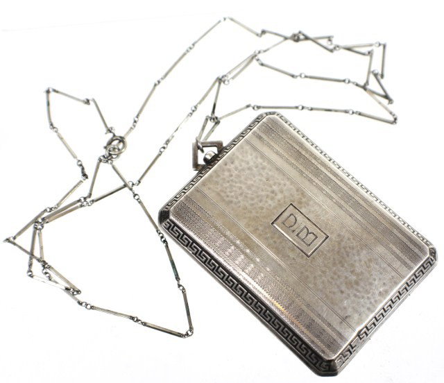 STERLING SILVER COMPACT: STERLING SILVER COMPACT Sterling Silver compact makeup and pillbox. Marked "PB" on cover and "Sterling, EK, and 1080 on inside." Size: 2.5 x 2"