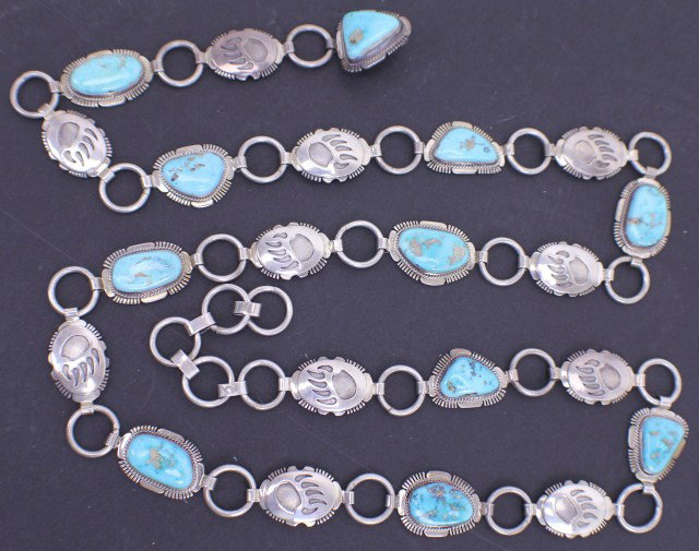 NAVAJO TURQUOISE STERLING BELT SIGNED J NELSON: NAVAJO TURQUOISE STERLING BELT SIGNED J NELSON Navajo Indian turquoise and sterling silver belt, signed J Nelson. John Nelson does many of his greatest pieces with the sky blue turquoise. This belt ha