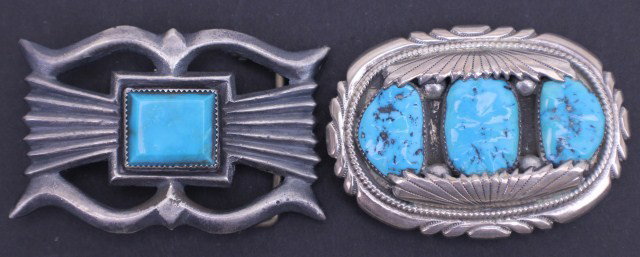 2 NAVAJO STERLING TURQUOISE BELT BUCKLES SIGNED: 2 NAVAJO STERLING TURQUOISE BELT BUCKLES SIGNED Navajo Indian turquoise & sterling silver belt buckles. The 3 stone buckle signed RLB weighs 56.6g. The single stone buckle signed by E. S. Mitchell wei