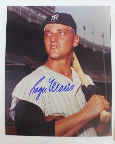 ROGER MARIS AUTOGRAPHED PHOTO: ROGER MARIS AUTOGRAPHED PHOTO Roger Maris Autographed photo in Yankee Pinstripes against the backdrop of Old Yankee Stadium. Signed in Blue Sharpie. Size: 8 x 10"