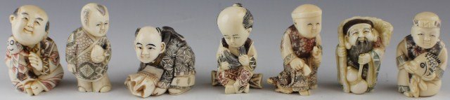 7 CARVED IVORY NETSUKE FIGURES: 7 CARVED IVORY NETSUKE FIGURES Seven elephant ivory carved Netsuke men. Figures have large heads. They are all wearing robes and holding assorted items. Size: approx. 2''