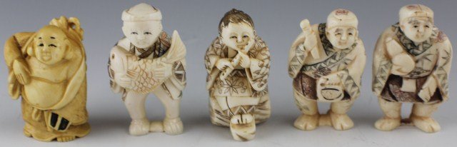 5 IVORY CARVED NETSUKE MEN: 5 IVORY CARVED NETSUKE MEN Five elephant ivory carved netsuke men. One is the immortal Chung-Li Ch'uan. One is sitting on a log playing a flute. The other three are standing holding various items. Siz