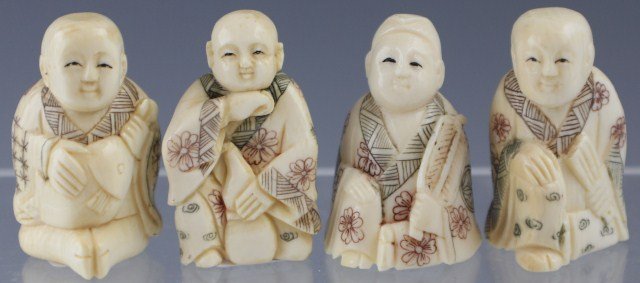 4 CARVED IVORY NETSUKE MEN: 4 CARVED IVORY NETSUKE MEN Four carved mammoth ivory netsuke depicting men sitting and kneeling holding a fan, a fish, a folded fan and a gourd. Size: 1.5"