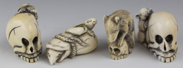 4 CARVED SIGNED IVORY NETSUKE - ANIMALS ON SKULLS: 4 CARVED SIGNED IVORY NETSUKE - ANIMALS ON SKULLS 3 figurines of animals on skulls: a rat, a turtle and another rodent. Also included is a carving of a rodent in a bag, on which a rabbit is perched. A