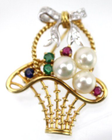 18K YELLOW GOLD PEARL & DIAMOND BASKET PIN: 18K YELLOW GOLD PEARL & DIAMOND BASKET PIN 18K yellow gold basket pin accented by 3 small pearls, a white gold bow of 9 small round cut diamonds and 5 small round gemstones; 2 rubies, 2 emeralds, and