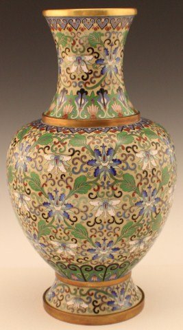 EARLY 20TH CENTURY CHINESE CLOISONNE VASE: EARLY 20TH CENTURY CHINESE CLOISONNE VASE Brass base metal with light tan enamel, the main design is of flowers and swirls in a repeated pattern around the vase. Size: 12.5" tall