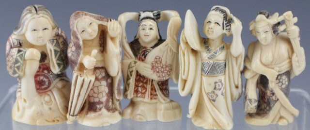 5 CARVED SIGNED IVORY FEMALE NETSUKE: 5 CARVED SIGNED IVORY FEMALE NETSUKE Various carved ivory netsuke depicting females holding fans, musical instruments, umbrellas and bags. All are shown wearing kimonos and are signed on bottom. (Plea