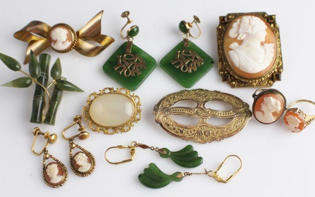ASSORTED LOT OF JADE GOLD CAMEO COSTUME JEWELRY: ASSORTED LOT OF JADE GOLD CAMEO COSTUME JEWELRY Assorted Lot of Jade, Gold, and Cameo jewelry to include; Pair of Jade Earrings marked 14k with "I Love You". Pair of Jade earrings, shells. Jade Bamboo