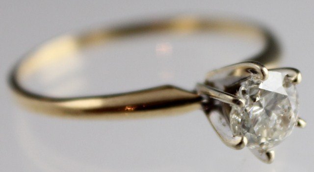 LADIES 14K GOLD ROUND DIAMOND SOLITAIRE 0.5 CT: LADIES 14K GOLD ROUND DIAMOND SOLITAIRE 0.5 CT 14K yellow gold diamond solitaire. Ring features round center diamond, approximately 0.5 ct set in six prong setting. Approximately SI-2 to I-1 clarity a