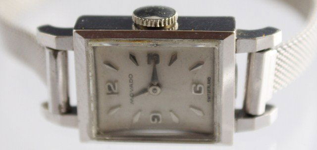 LADIES VINTAGE 14K MOVADO 17 JEWEL WATCH: LADIES VINTAGE 14K MOVADO 17 JEWEL WATCH A ladies Movado watch consisting of a 14K white gold case, 17 Jewel Swiss movement and a stainless steel mesh band. Watch appears to be in working order, runs