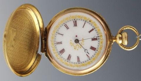 PATEK PHILIPPE 18K GOLD HUNTER CASE POCKET WATCH: PATEK PHILIPPE 18K GOLD HUNTER CASE POCKET WATCH Sidewinder Size 6 Patek Philippe pocket watch in a chase engraved 18k hunter case. Porcelain dial, brown roman numerals and decorated with gold highlig