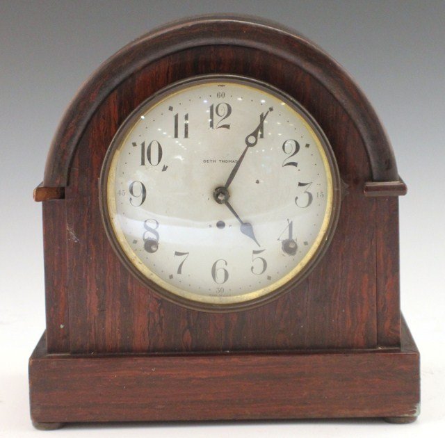 20TH CENTURY SETH THOMAS MANTLE CLOCK: 20TH CENTURY SETH THOMAS MANTLE CLOCK Wood case dome top mantle clock by Seth Thomas. Size: 9" x 5" x 9"