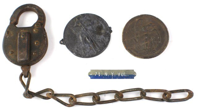 CIVIL WAR ERA ITEMS DETECTOR FINDS: CIVIL WAR ERA ITEMS DETECTOR FINDS A small lot of civil war period battlefield finds. All found with a metal detector. Lock and chain, cross belt plate, A large St Christopher and a "71. N.Y. Vol". Si