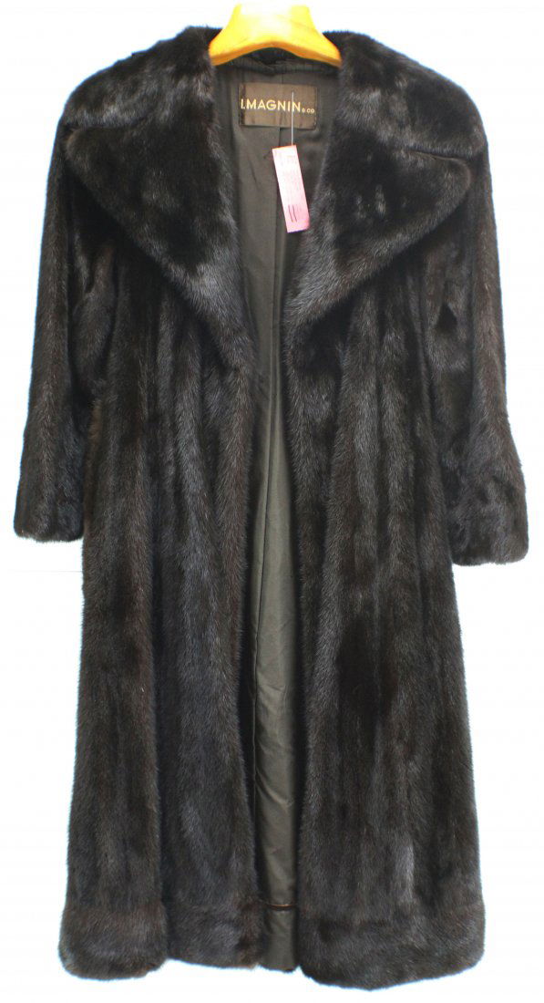 MENS RANCH FULL LENGTH MINK COAT I.MAGNIN & CO.: Beautiful Men's Dark Mink Coat with original price tag of $4500.00 from I. Magnin & Co. Size M, L-48", B-18", S-20", S to Cuff-26". With Mink Belt. Comes in blue dust protector.