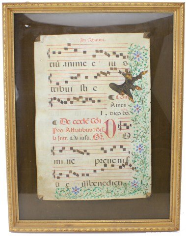 16TH CENT. ILLUMINATED MUSIC SCORE ON VELLUM: 16TH CENT. ILLUMINATED MUSIC SCORE ON VELLUM Early 16th Century illuminated musical score on vellum. Framed and float mounted on to suede mat board, under glass. Score in Latin, features a floral bord