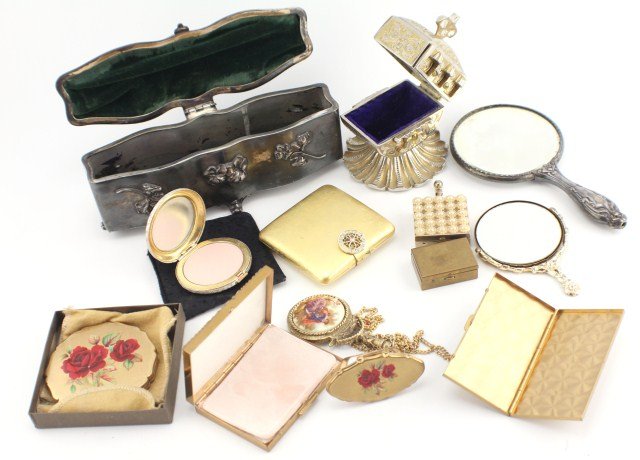LOT OF VINTAGE MIRRORS AND ACCESSORIES: LOT OF VINTAGE MIRRORS AND ACCESSORIES Lipstick clip on mirror, two dresser trinket boxes, vintage perfume, four compacts with make up, three mirrors, three pill boxes. , Size: varies, Est. 50-150, Lo