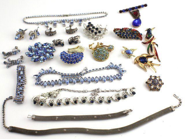VINTAGE BLUE RHINESTONE COSTUME JEWELRY 19 PIECES: VINTAGE BLUE RHINESTONE COSTUME JEWELRY 19 PIECES "Mamselle" feather pin; bicycle pin; three bird pins, one marked "Coro"; "Usner" pin; four unmarked pins; two necklaces (one by "La Rel"), two pairs e