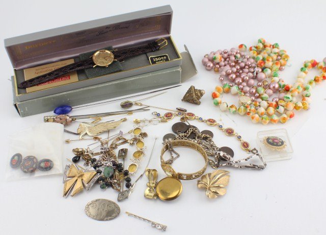 VINTAGE COSTUME JEWELRY: VINTAGE COSTUME JEWELRY Large lot of vintage costume jewelry including hat/stick pins, six bracelets, watch, necklace, seven pins including enamel locket pin, two broken beaded necklaces, and Lucien P