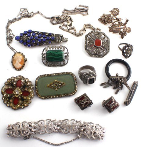 LOT VINTAGE MARCASITE JEWELRY W/ SOME SILVER: LOT VINTAGE MARCASITE JEWELRY W/ SOME SILVER Contains six pins, two pendants, two rings, a pair of clip on earrings, and a bracelet. The green pin is marked "Catherine Popesco, France). Some of the je