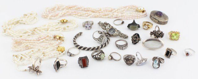 LADIES STERLING MARCASITE AND PEARL JEWELRY: LADIES STERLING MARCASITE AND PEARL JEWELRY Two pearl necklaces with matching bracelets. Sterling cuff bracelet and pill box. 21 rings, and Gloria Vanderbilt marcasite watch. Weight: 9.5 ozt, Size: va