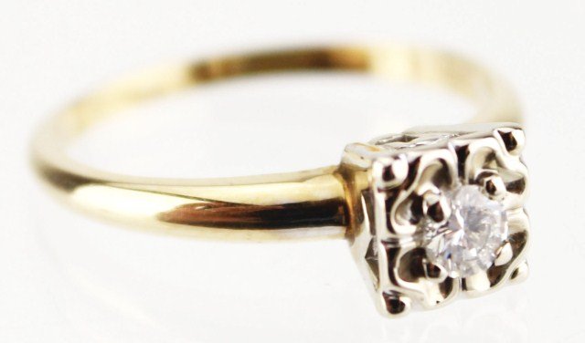 LADIES 14K GOLD DIAMOND SOLITAIRE ENGAGEMENT RING: LADIES 14K GOLD DIAMOND SOLITAIRE ENGAGEMENT RING Ladies vintage style engagement ring featuring a 0.18 ct round cut diamond, bead set in a 14K white gold square setting. 14K yellow gold band. Weight: