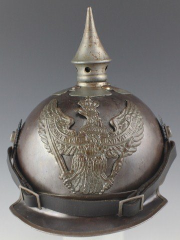 WWI PRUSSIAN M16 CUIRASSIER PARTS REPLICA HELMET: WWI PRUSSIAN M16 CUIRASSIER PARTS REPLICA HELMET A Prussian Cuirassier or lobster tail helmet dated to WWI trench warfare, before the development of the Stahlhelm. Features a squared off visor and sin
