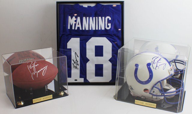 PEYTON MANNING AUTOGRAPHED LOT: PEYTON MANNING AUTOGRAPHED LOT Peyton Manning Autographed Lot to include Colts Authentic Pro Line Helmet, with Mirror Back Display Case. NFL Wilson Authentic Football with Mirror Back Display Case. Bl