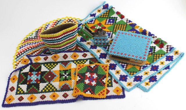 LOT OF INUIT BEADED ITEMS - GREENLAND: LOT OF INUIT BEADED ITEMS - GREENLAND Three beaded mats; 13 x 15.5" (some tears in beadwork), 12.5 x 7", & 4.5 x 3.5". Beaded Zippo cover (lighter included). Beaded matchbox cover (bottom needs to be