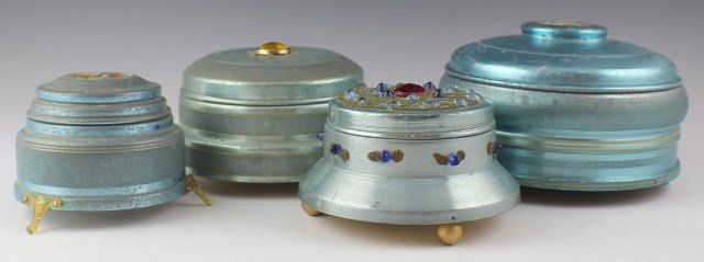 4 VINTAGE MUSICAL POWDER PUFF BOXES: 4 VINTAGE MUSICAL POWDER PUFF BOXES Lot of 4 musical powder puff boxes. 1 Thorens box and 3 from unknown makers. Largest box with divided glass dish inside, this box is not working. The other 3 boxes