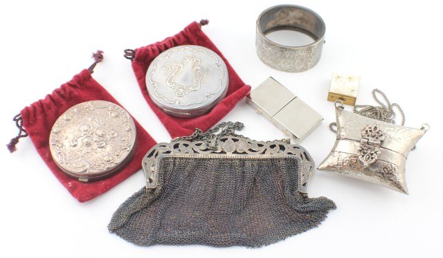 LADIES SILVER PLATED VANITY LOT: LADIES SILVER PLATED VANITY LOT Lot of silver plated ladies items. Mesh purse monogrammed "MCM", hinged bangle bracelet, 2 pill boxes, 2 Gorham mirrored powder compacts, and travel sewing purse with t
