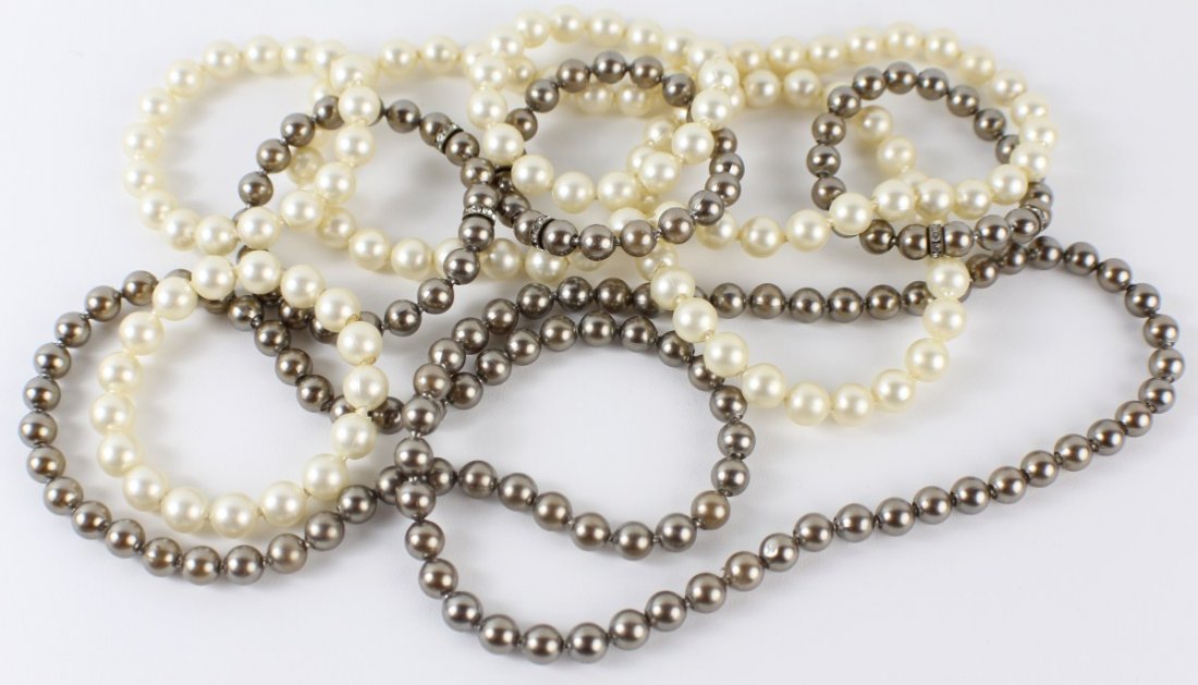 VINTAGE POP BEADS - BRONZE & PEARL TONES: VINTAGE POP BEADS - BRONZE & PEARL TONES Two sets of vintage pop beads, plastic beads which snap together. Colors included are both bronze and pearl, can be arranged into different sizes and combinati