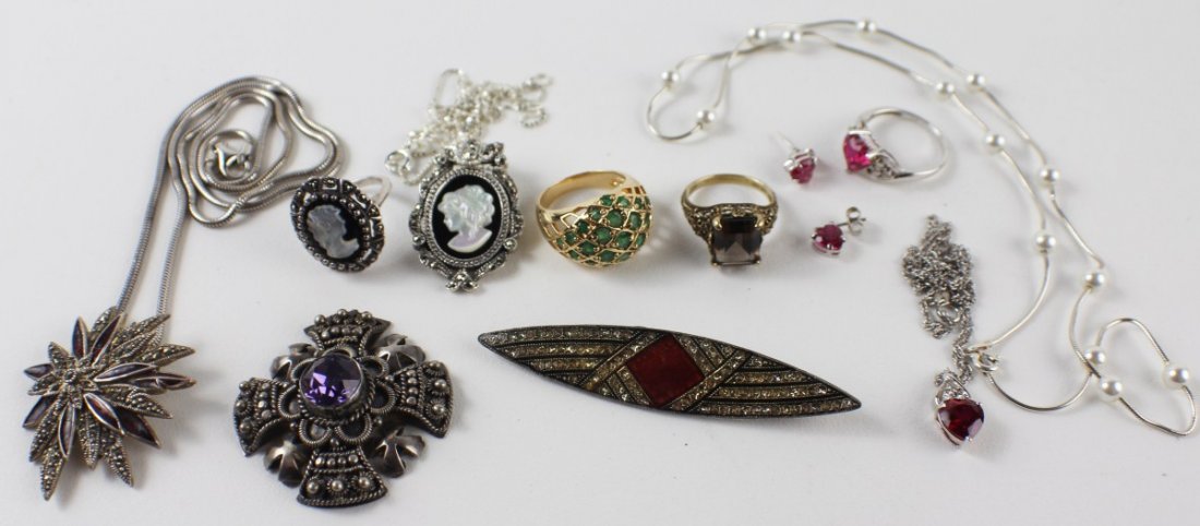 LOT OF LADIES STERLING JEWELRY SOME VINTAGE: LOT OF LADIES STERLING JEWELRY SOME VINTAGE Includes red enamel and marcasite floral pendant on chain; sterling chain with 18 floating pearls; sterling modern cameo pin/pendant with matching ring; pin