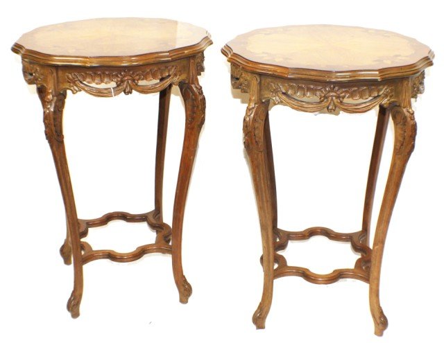 WOOD INLAY OCCASIONAL TABLE PAIR: WOOD INLAY OCCASIONAL TABLE PAIR Two circular wooden occasional tables with elegant mixed wood marquetry on top. Supported by four cabriole table legs that end in scrolled feet and emerge from maze li