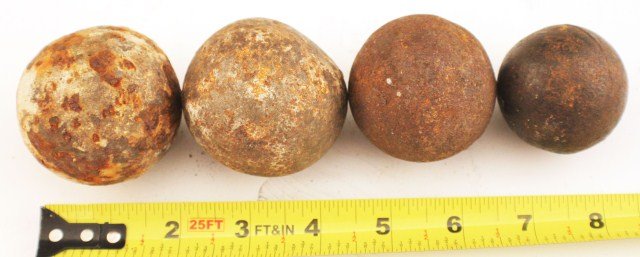 CIVIL WAR ERA CAST IRON GRAPE-SHOT CANNONBALL: CIVIL WAR ERA CAST IRON GRAPE-SHOT CANNONBALL Four small, Heavy cast iron balls. Each are approximately 1.5" to 2.5" diameter. Some wear and signs of rust otherwise VGC. One has been re-painted. Size: