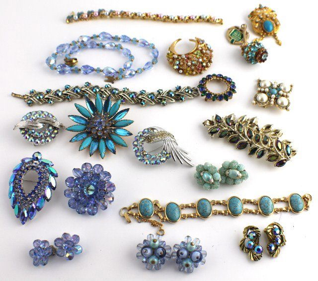VINTAGE BLUE RHINESTONE COSTUME JEWELRY 19 PIECES: VINTAGE BLUE RHINESTONE COSTUME JEWELRY 19 PIECES "Monet" pin; "ART pin"; 2 "Coro" bracelets and pins; "Sarah Covington" pin; "Joan Rivers bracelet; clip on earrings marked "Japan"; "Judy Lee" bracele