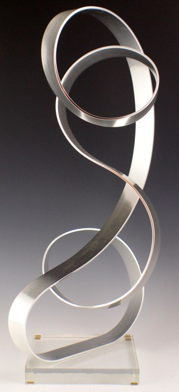 DAN MURPHY - ALUMINUM & LUCITE SCULPTURE: DAN MURPHY - ALUMINUM & LUCITE SCULPTURE Dan Murphy: USA; lucite, metal (Aluminum). Modern sculpture by Dan Murphy, signed and dated 1979. Dimensions: 22"h, 11.5"w, 10"d. Size: 22"h, 11.5"w, 10"d Est.