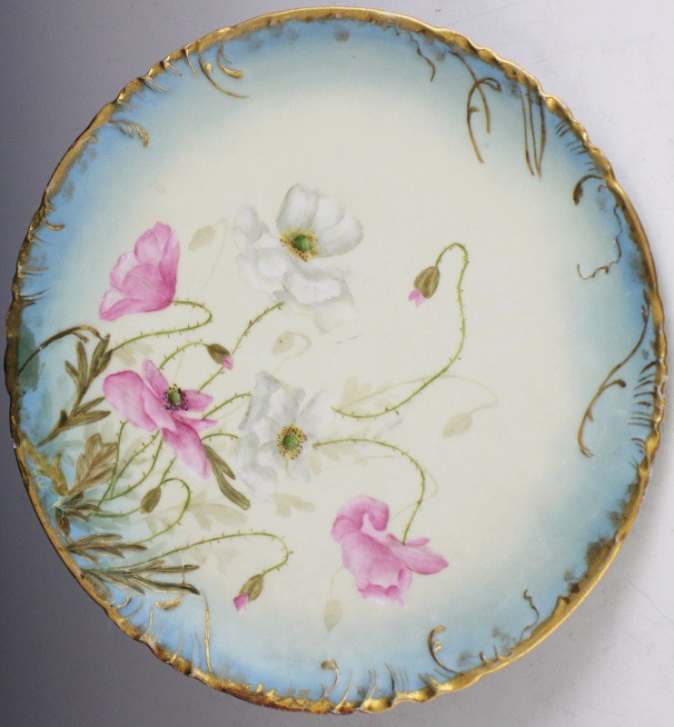 19TH CENTURY LIMOGES PAINTED LARGE FLORAL PLATE: 19TH CENTURY LIMOGES PAINTED LARGE FLORAL PLATE Large Limoges plate, hand painted with pink and white flowers, with gilt trim. Signed F. Cadel, 1893. Some paint loss around edges, chip in back side of