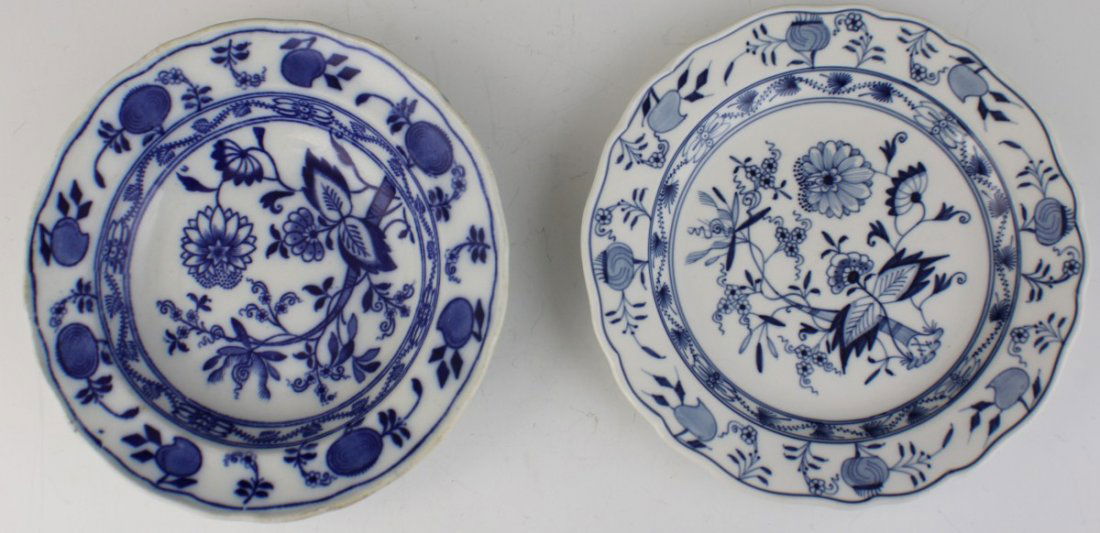 MEISSEN PORCELAIN BLUE ONION PLATE & FLOW BOWL: MEISSEN PORCELAIN BLUE ONION PLATE & FLOW BOWL Group of two porcelain Meissen pieces. Blue Onion plate has the crossed sword mark. Blue Flow bowl has the Meissen England Crown mark. Size: 8.25" Est. $