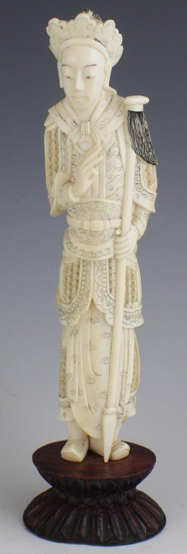 IVORY CHINESE FIGURE OF A IMPERIAL SOLDIER: IVORY CHINESE FIGURE OF A IMPERIAL SOLDIER Very fine hand carved young soldier standing at attention with his spear in one hand. Figure is standing on a 1" wooden base. Size: 8.5" Est. $ 300-500 Lot 3