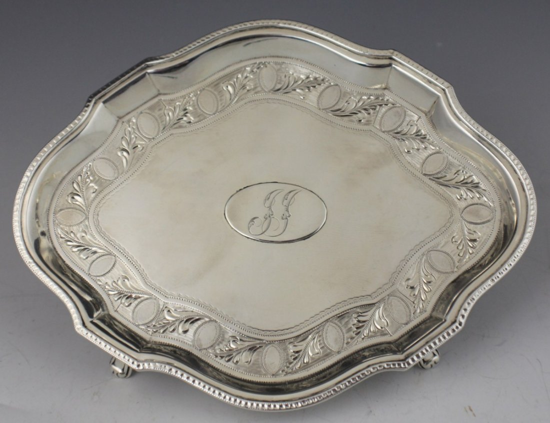GEORGE III STERLING SILVER TEAPOT STAND 1791: GEORGE III STERLING SILVER TEAPOT STAND 1791 Hand chased, George III sterling silver teapot stand, of oval form with bright cut decoration, maker Robert Hennell. London hallmark for 1791, 117g total w