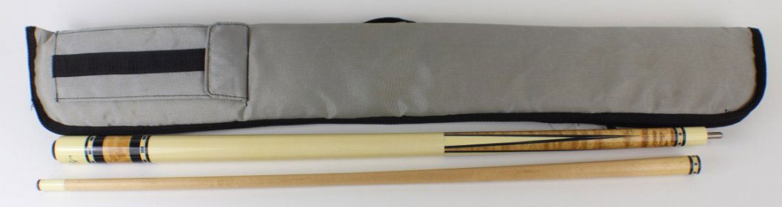 MEUCCI POOL CUE IN CASE: MEUCCI POOL CUE IN CASE Meucci two piece ivory colored pool cue with wood inlay in a gray cloth case. Size: 58" Est. $ 75-150 Lot 31684